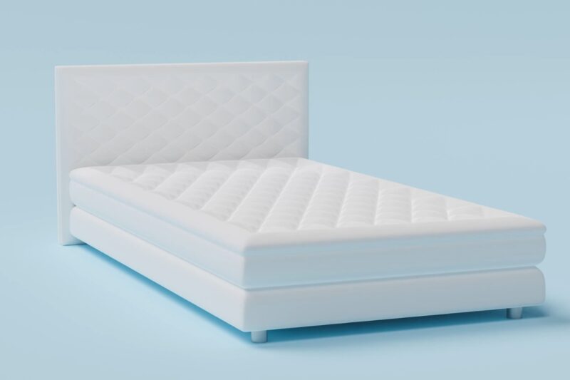 prikaz kreveta i dušeka na plavoj pozadini